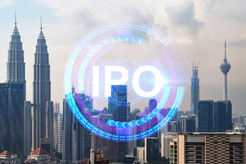 IPO icon hologram over panorama city view of Kuala Lumpur. KL is the hub of initial public offering...