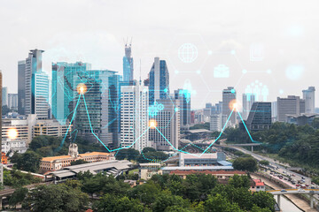 Research and development hologram over panorama city view of Kuala Lumpur. KL is hub of new technologies to optimize business in Malaysia, Asia. Concept of exceeding opportunities. Double exposure.