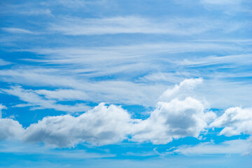 white could with the blue sky in the summer.