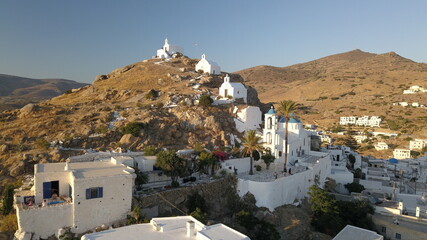 Fototapeta premium Ancient castle in the harbor of Chora town view from top Ios Greece