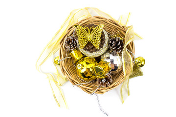 Christmas golden and silver decorations on white background. Basket weave on table top view