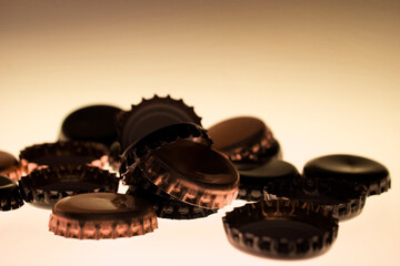 beer caps on a light background