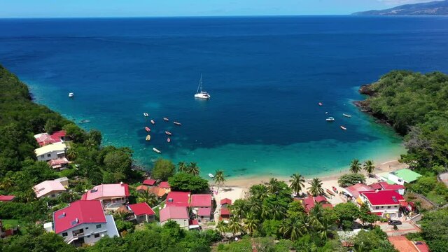Anse dufour famous snorkeling bay turtle watching Martinique aerial sunny day caribbean houses tropical vibes