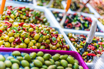 Assorted olives put up for sale on the italian street stall