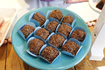 Brazilian chocolate sweets called brigadeiro  traditional at children's party
