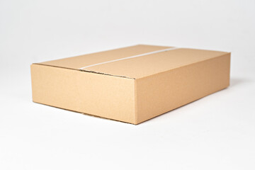 Brown carton box on a white background