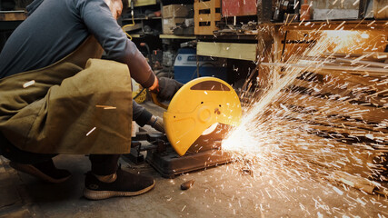 Sawing with a circular saw metal, many sparks. Safety violation