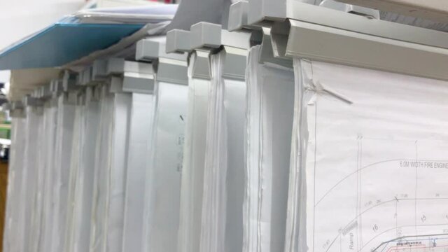 White Building Plans in a Tray