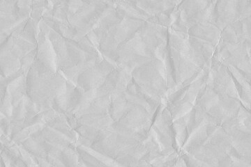 Fototapeta premium White vintage and old looking crumpled paper background. Retro cardboard texture. Grunge paper for drawing. Ancient book page. Present wrapping.