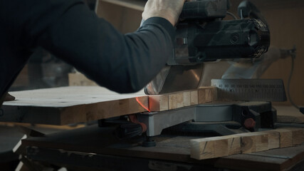 Circular Saw. Carpenter Using Circular Saw for wood