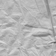 Naklejka premium White vintage and old looking crumpled paper background. Retro cardboard texture. Grunge paper for drawing. Ancient book page. Present wrapping.