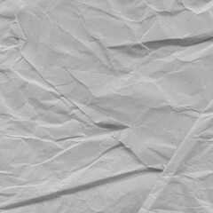 Fototapeta premium White vintage and old looking crumpled paper background. Retro cardboard texture. Grunge paper for drawing. Ancient book page. Present wrapping.