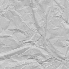 Obraz premium White vintage and old looking crumpled paper background. Retro cardboard texture. Grunge paper for drawing. Ancient book page. Present wrapping.