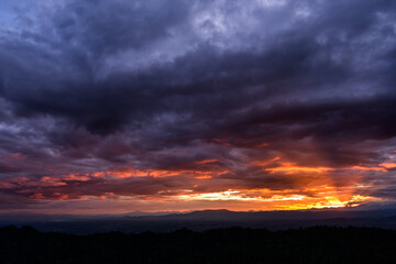 Majestic sunset in the mountains landscape. Dramatic sky.