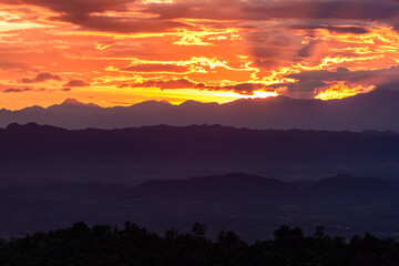 Majestic sunset in the mountains landscape. Dramatic sky.