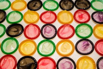 Colorful condoms background.