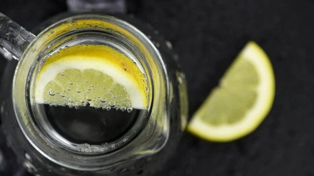 Portion of chilled sparkling water as seamless loopable footage (4K)