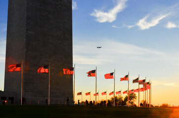 U.S. national flags and Washington Monument during sunset - Washington D.C. Unied Staes of America