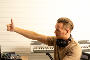 young attractive Caucasian woman musician singer in recoding studio with microphone. Performance...