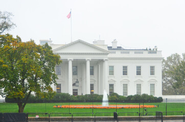 Fototapeta na wymiar White House on a misty autumn day - Washington DC, USA