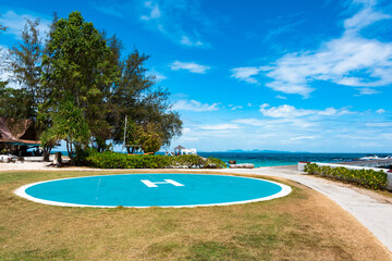 helicopter landing pad on a tropical island