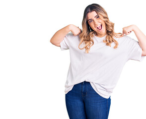 Young caucasian woman wearing casual clothes looking confident with smile on face, pointing oneself with fingers proud and happy.