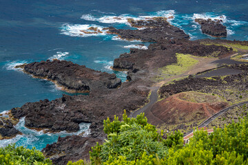 Azores, Sao Miguel Island, Ponta da Ferraria, small volcano Pico das Camarhinas and the cold lava...