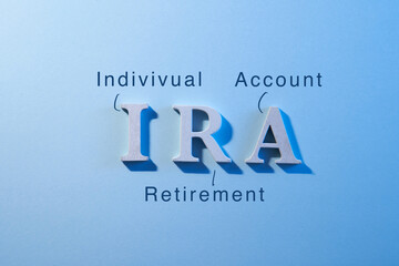 close up of aphabet ira on blue background, indivivual  account retirement