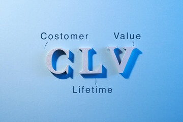 close up of aphabet c l tv on blue background, customer lifetime value