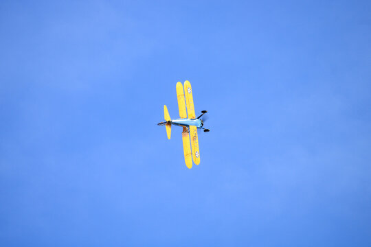 Biplane stearman pt 17 performing aerobatics. Used for air shows because very light and handy. Cerny, France. October 13. 2019.