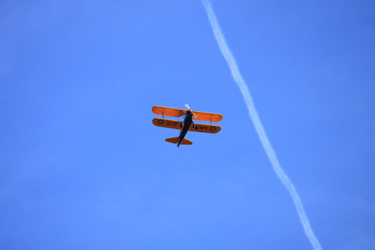 Biplane stearman pt 17 performing aerobatics. Used for air shows because very light and handy. Cerny, France. October 13. 2019.