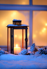 snowy house exterior with lantern
