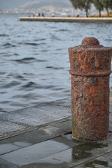 Naklejka premium Mooring bollard. Rusty old mooring bollards.