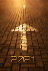 2021 New year and arrow on the road background. Forward New Year concept with arrow and 2021 number at sunset. Concept of planning, business, strategy, opportunity, goals, career and change