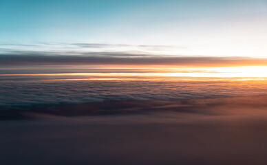 Fototapeta na wymiar Dramatic background. Beatiful sunset sky above clouds