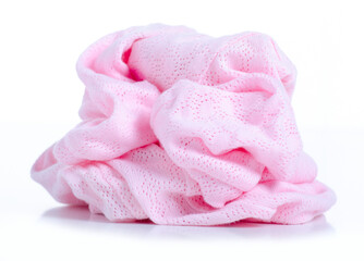 Pink crumpled fabric cloth on white background
