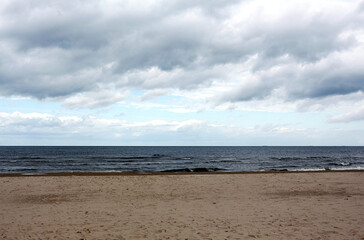 Fototapeta na wymiar Beautiful seascape on a cloudy day. Baltic Sea coast in Latvia.