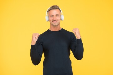 best day ever. cheerful music lover. sound quality. confident guy with headphones. handsome man...
