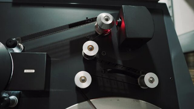 16 mm film loaded on rolls in a screening machine
