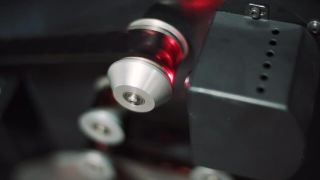 16 mm film tape on the muviola.  Closeup.