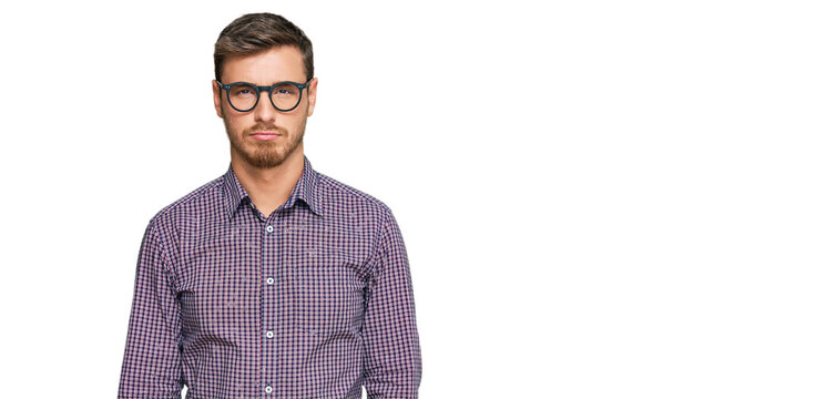 Handsome caucasian man wearing casual clothes and glasses depressed and worry for distress, crying angry and afraid. sad expression.