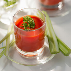 Healthy eating tomato juice and celery, close up