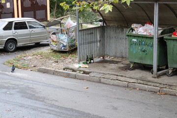 site with garbage collection containers