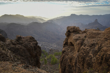 Valley full of mountains and volcanic rocks in Gran Canaria during sunset.