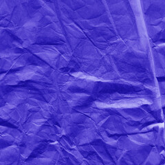 Violet vintage and old looking crumpled paper background. Retro cardboard texture. Grunge paper for drawing. Ancient book page. Present wrapping.
