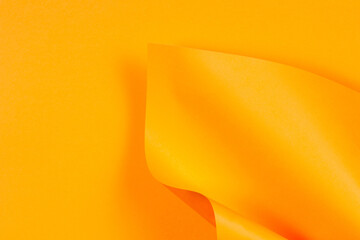 Abstract geometric shape orange color paper background