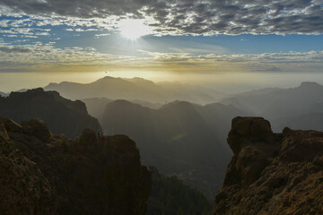 Valley full of mountains and volcanic rocks in Gran Canaria during sunset.