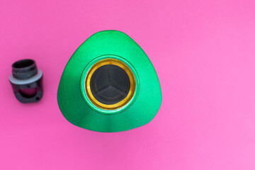 Open metal water bottle on a pink background. Top view. With copy space.