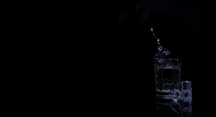 Splashing drink on a black background