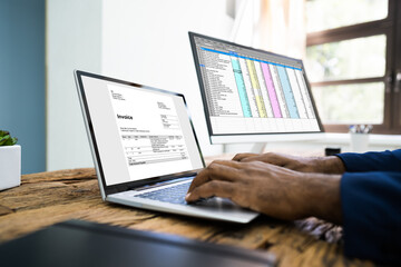 Young African Man Looking At Online Taxes Invoice